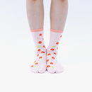 Person wearing long pink Tabi Socks " Shika-no Ashiato ", front view