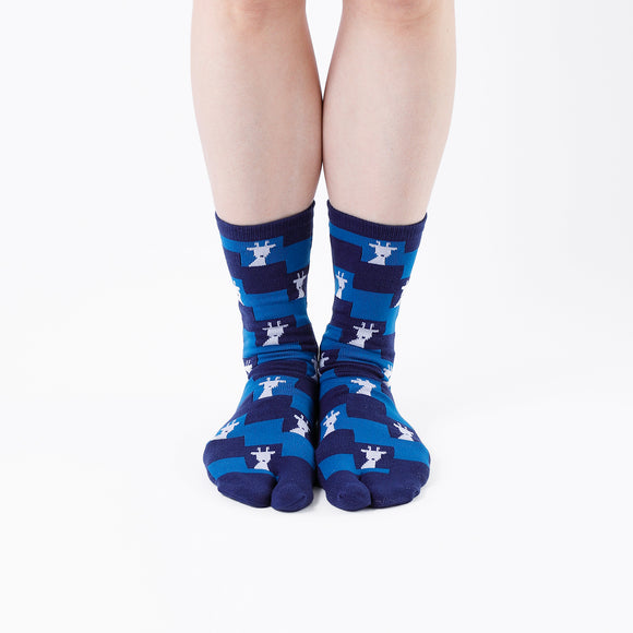 Person wearing long blue Tabi Socks " Shika Nozoku ", front view