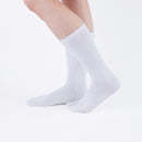 Person wearing  white Tabi Socks "NOBI NOBI", right side view